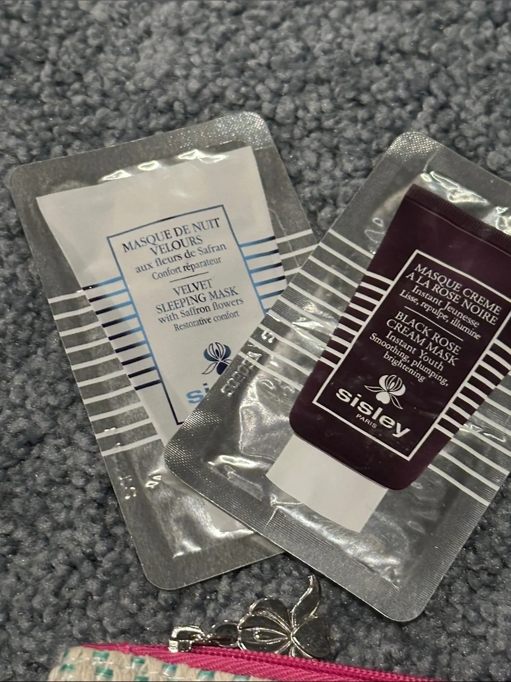 Sisley Travel Skincare Set with Pink, Black & Cream Woven Pouch